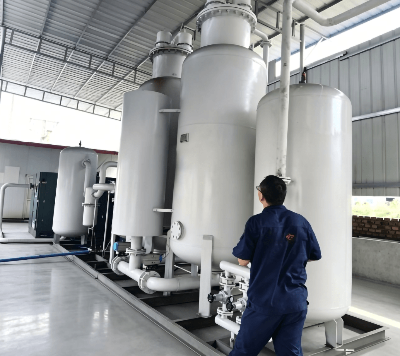Engineer inspecting nitrogen generator operating status
